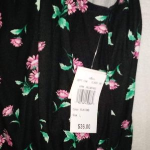 Brand new with tags woman's romper size LG $20